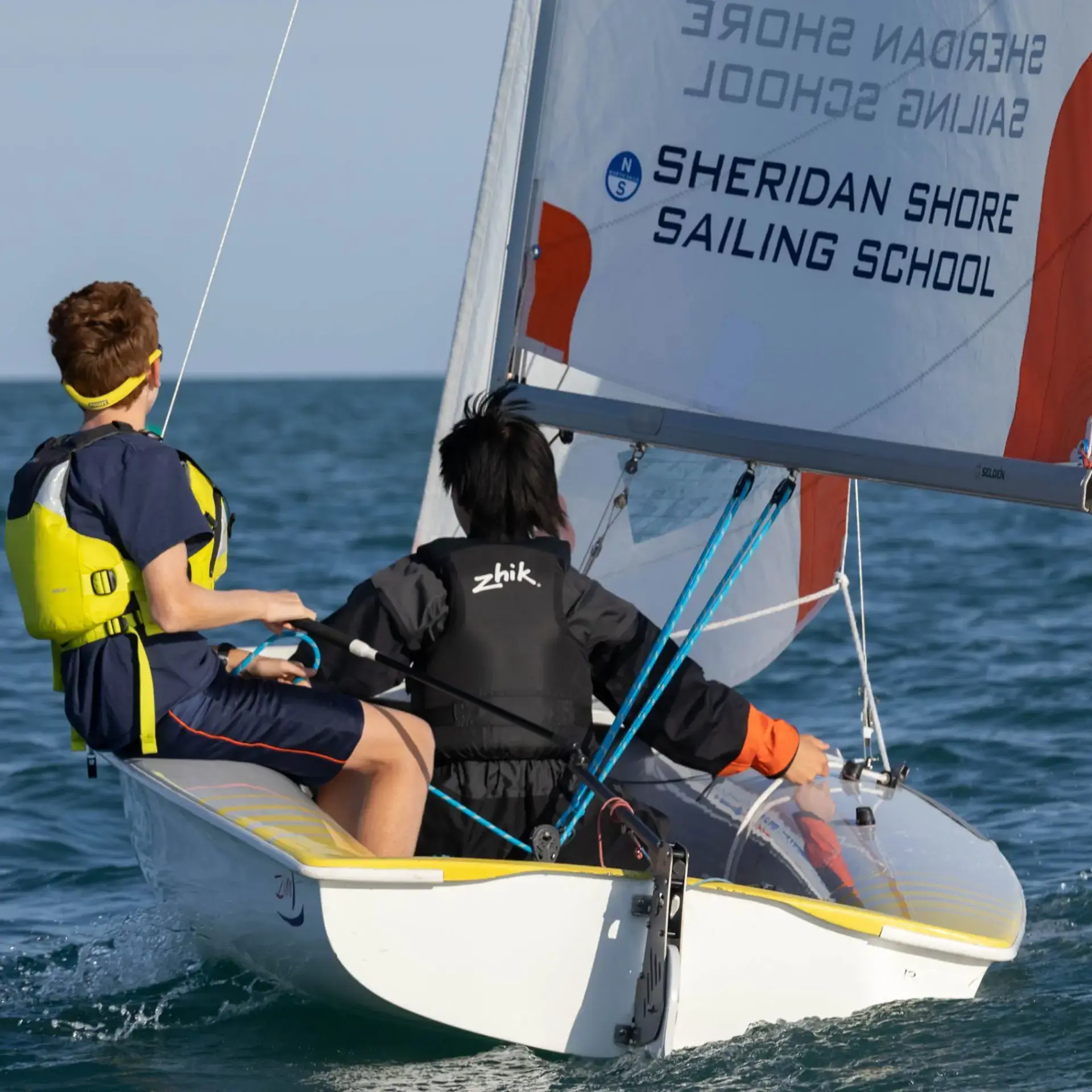Sailors on lake