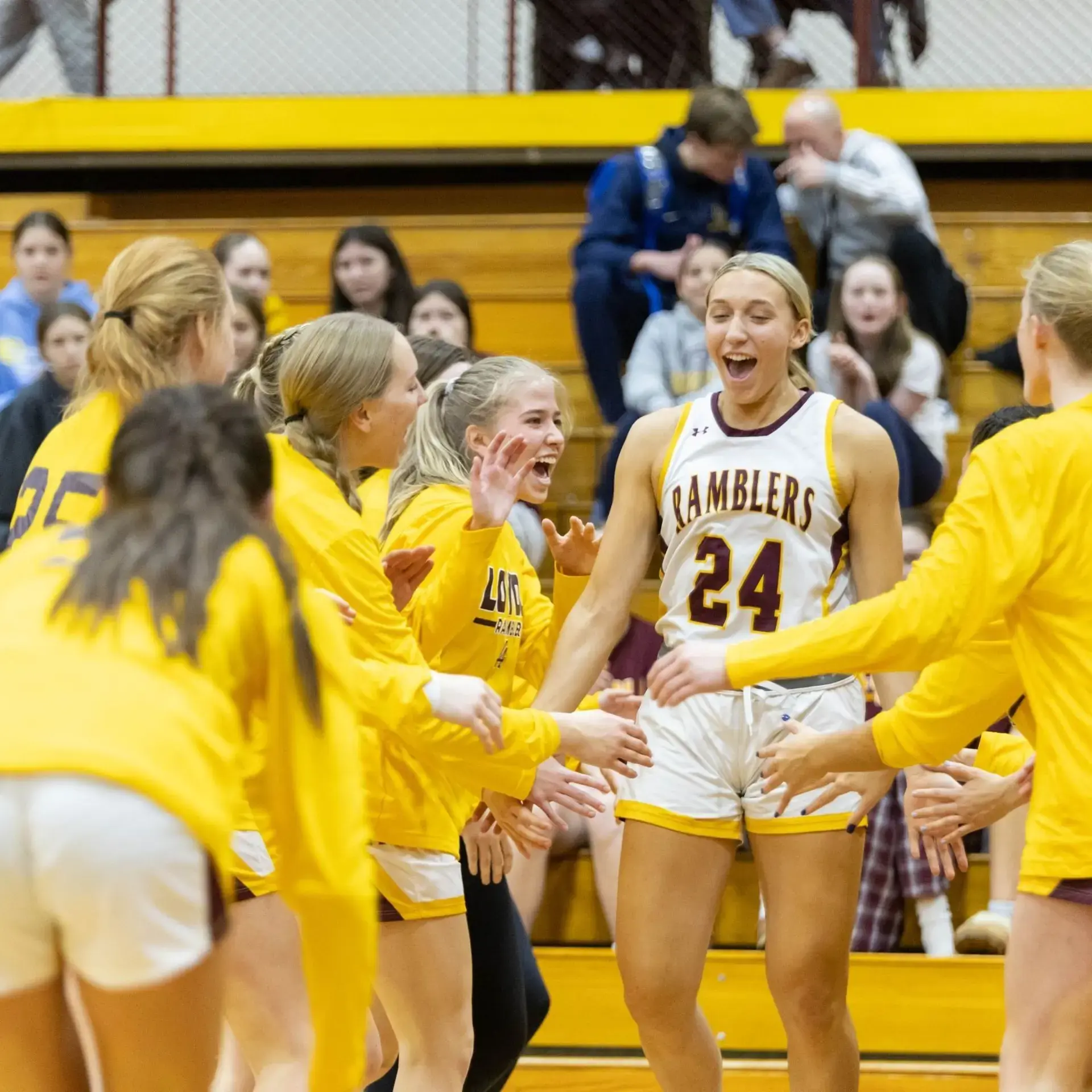 Student basketball players celebrating