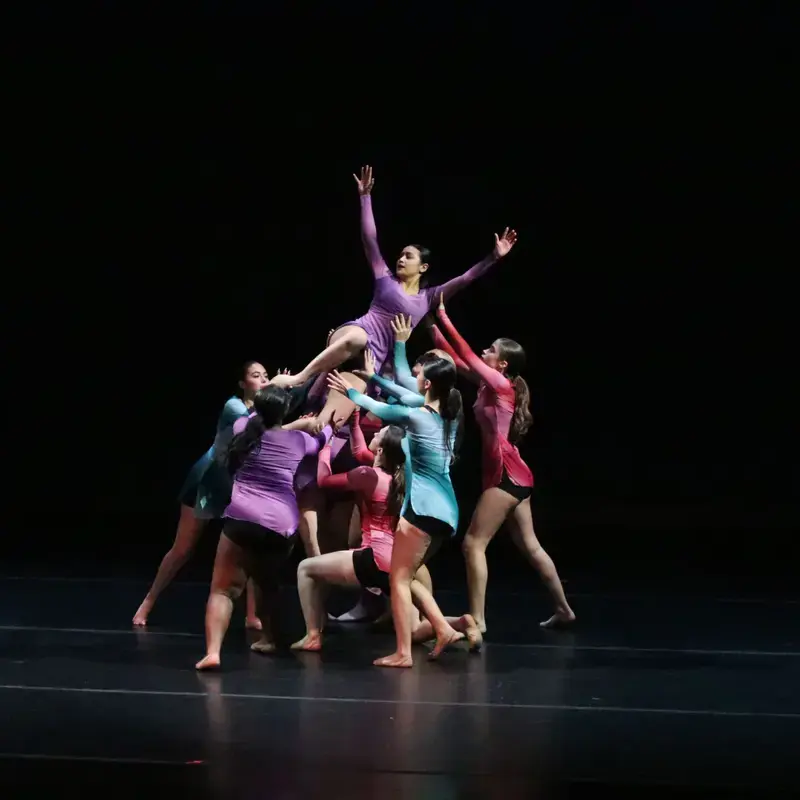 Loyola Academy dance students performing in a concert in the McGrath Family Performing Arts Center.