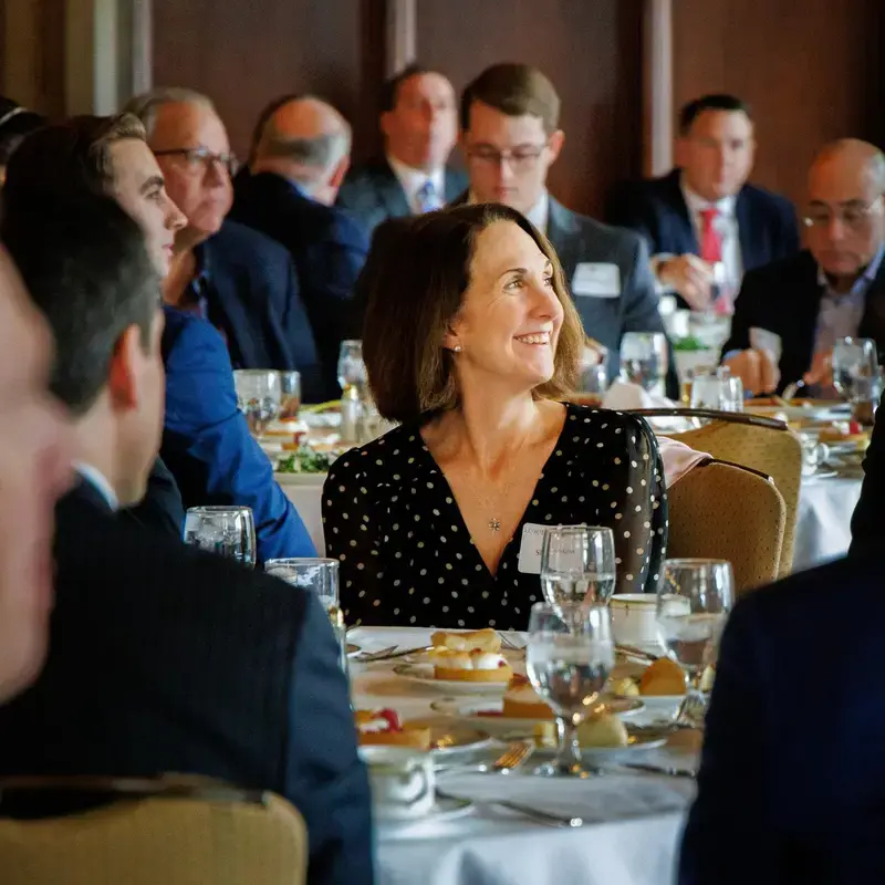 smiling women at luncheon