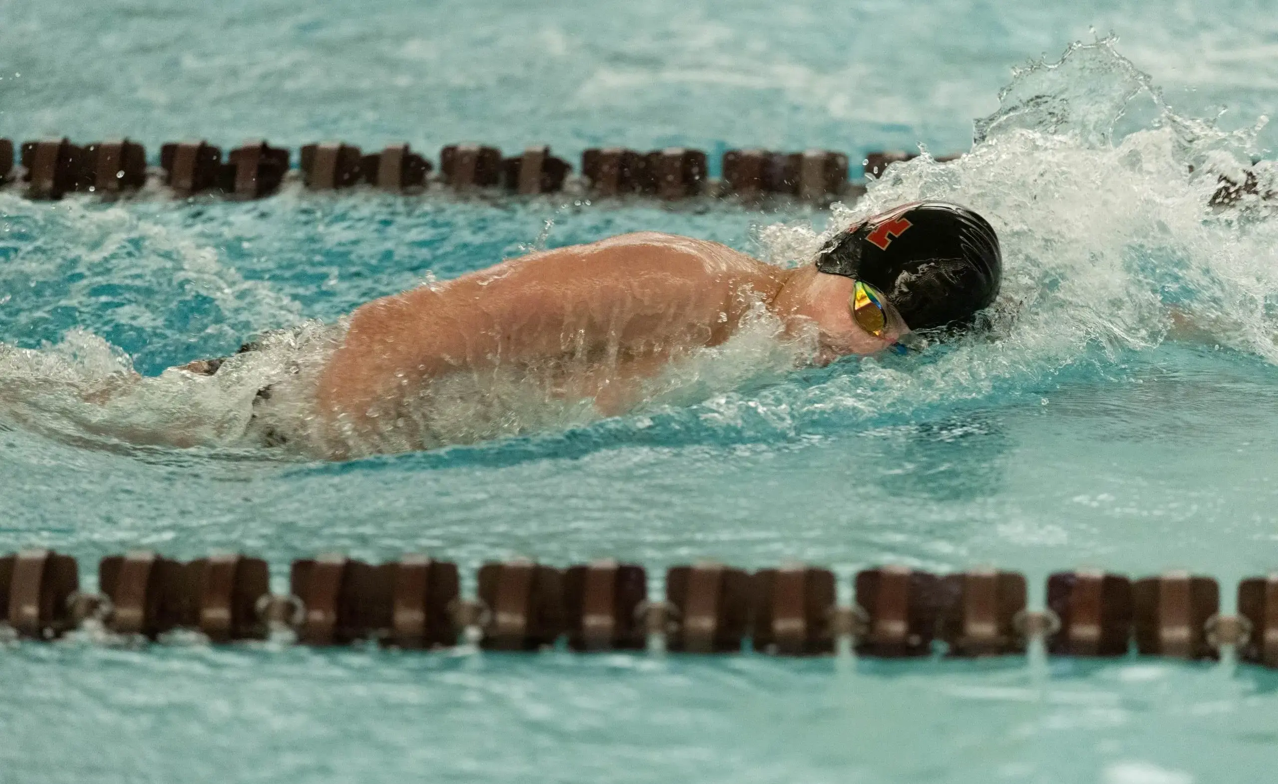 Students swimming in school pool