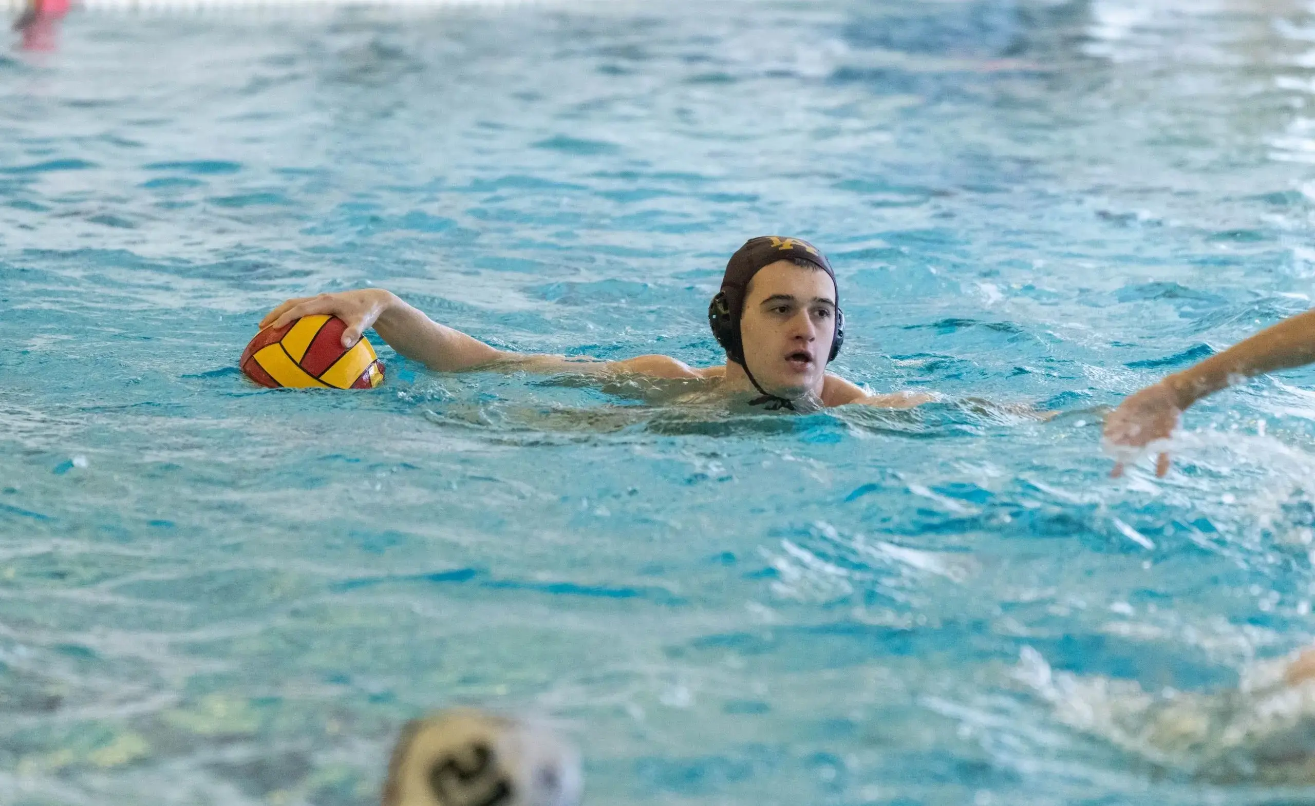 Students playing water polo