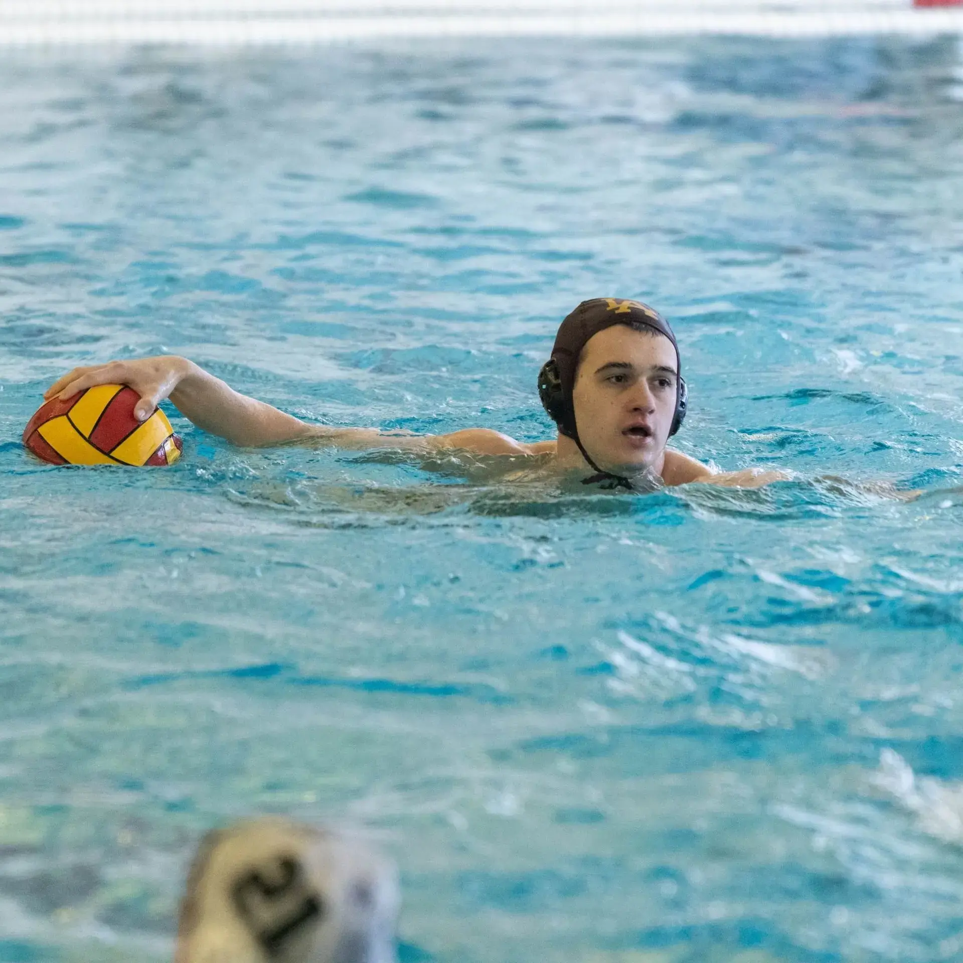Students playing water polo