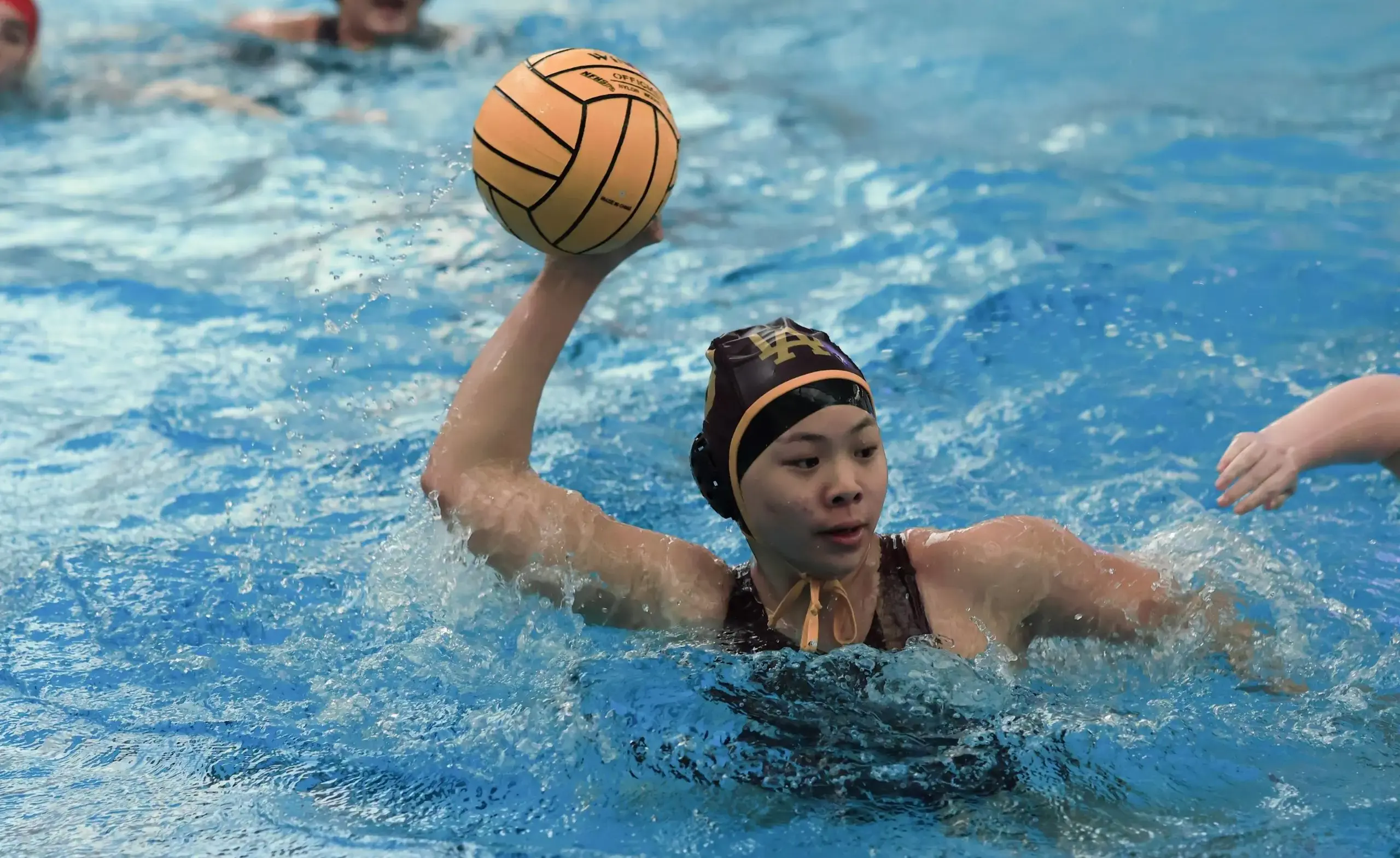Students playing water polo